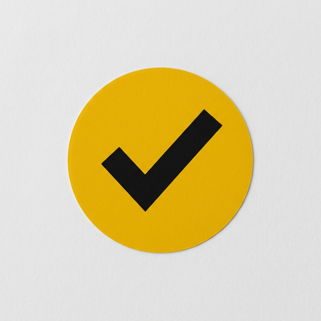 Black checkmark symbol on yellow circular background